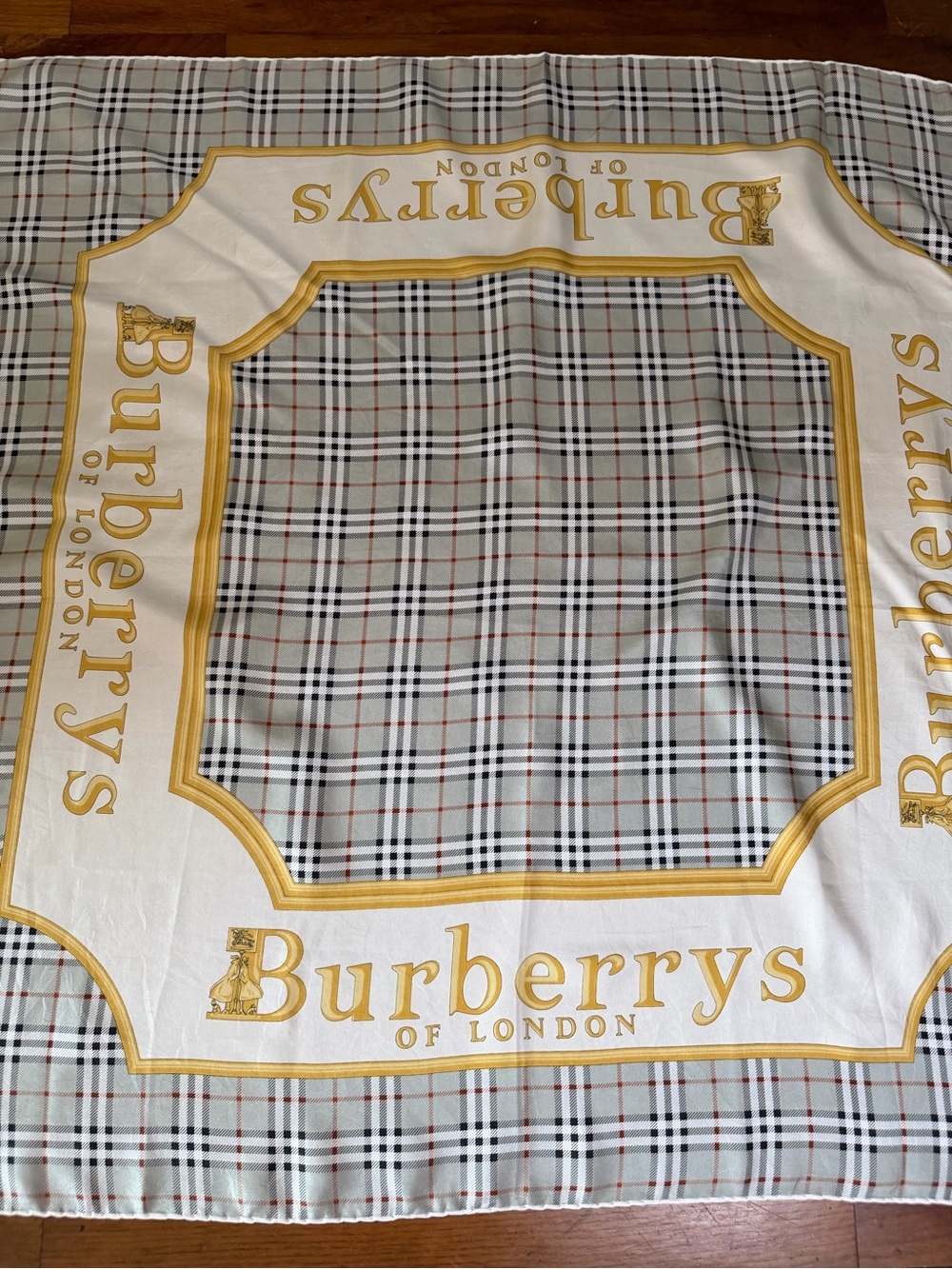Burberry Stylish Plaid Checkered Silk Scarf.